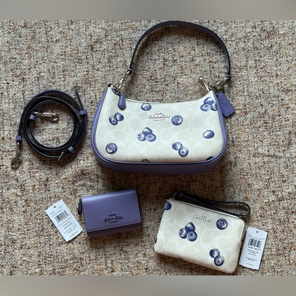 Coach Handbags - 🫐Coach corner zip wristlet in blueberry print🫐